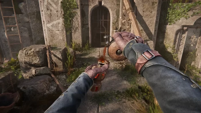 游戏Advantage画面截图，第一人称视角，一只手正在将液体倒入火把中，背景是一片废墟